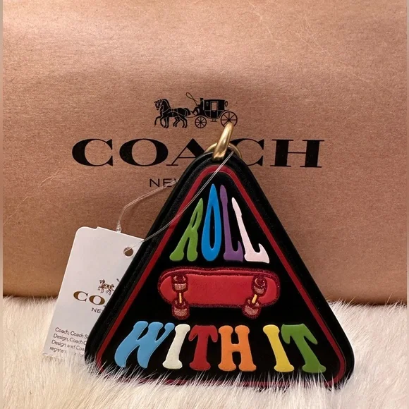NWT COACH Triangle “Roll With It” Keychain - Picture 1 of 3